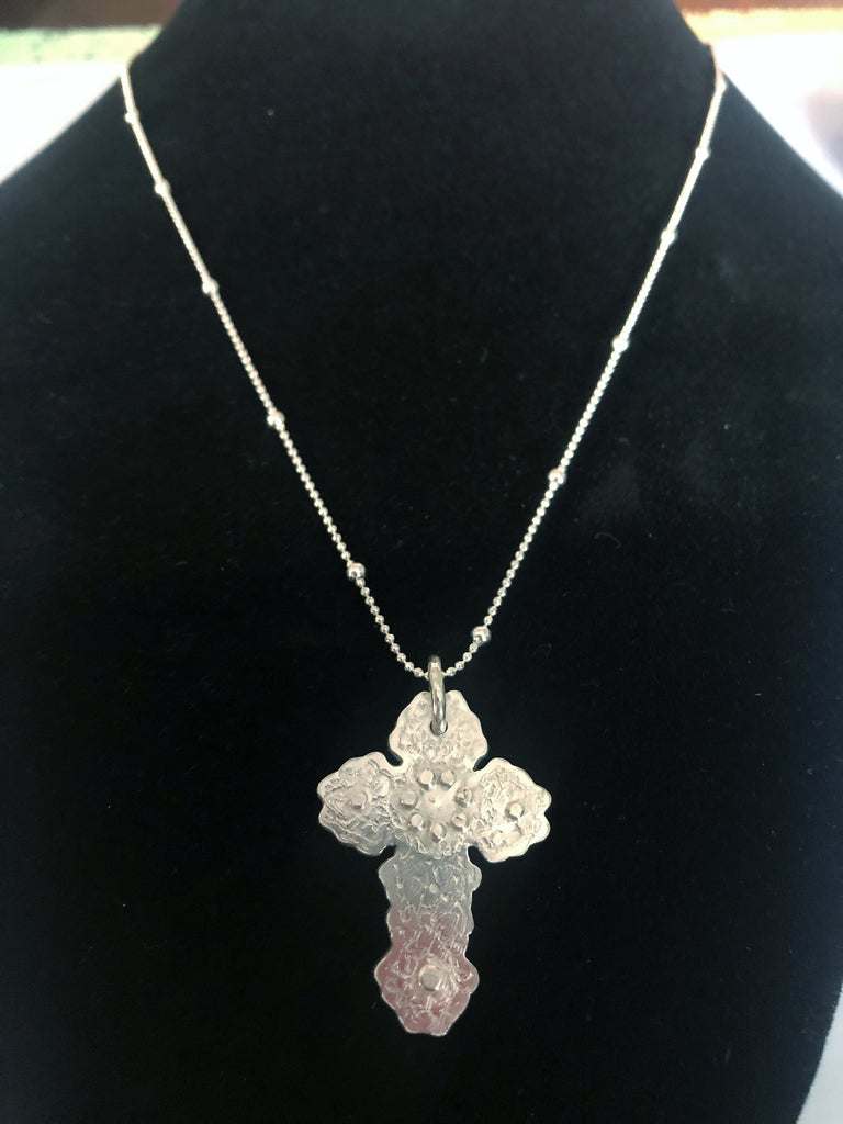 floral inspired cross pendant