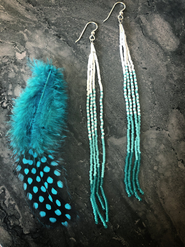 Turquoise colored fringe earrings