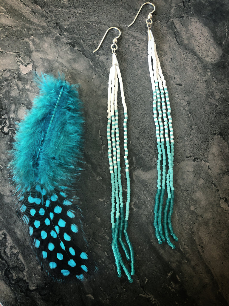 Turquoise colored fringe earrings