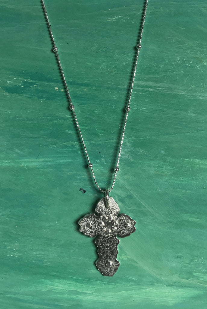 floral inspired cross pendant